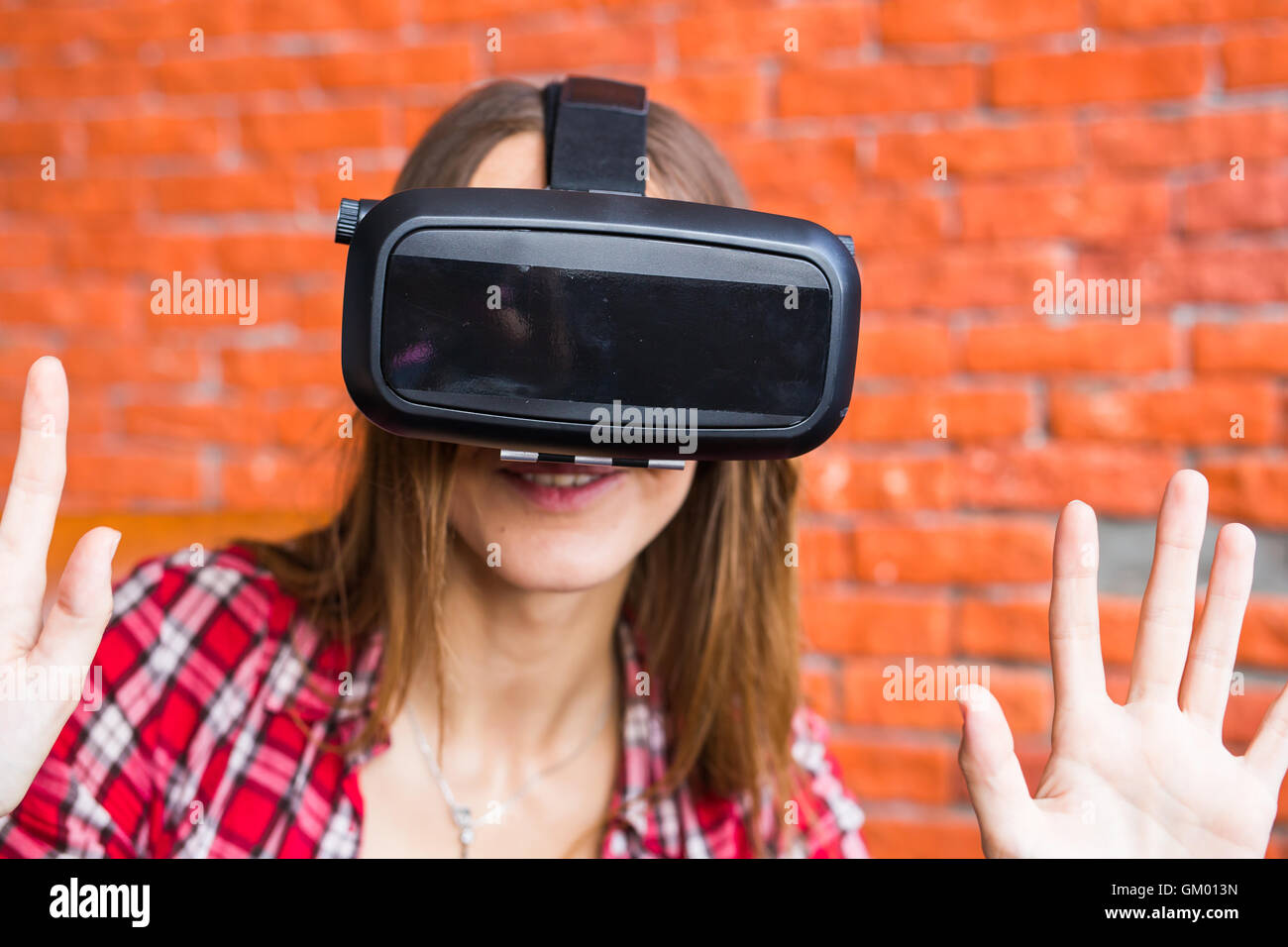 Young Woman Wearing Virtual Reality Headset Stock Photo - Alamy
