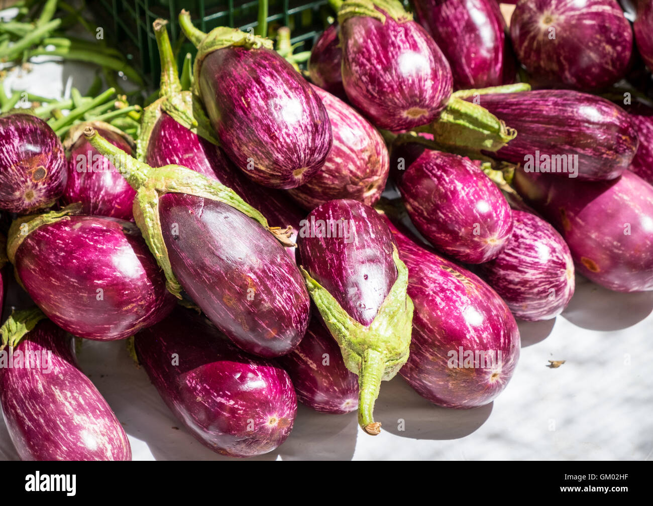 Fresh Aubergines (eggplant) for sale in Old Alcudia market Mallorca Majorca Stock Photo