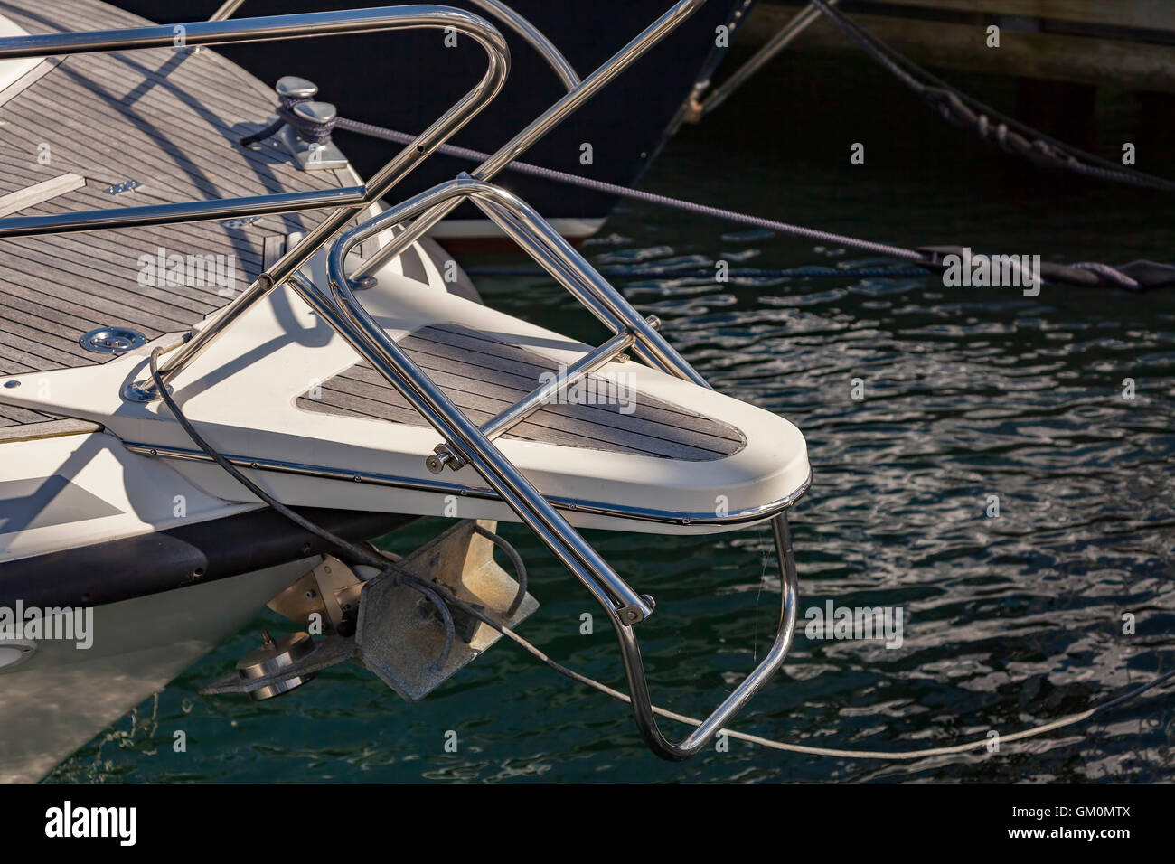 Detail of a diving or swimming platform on a luxury yacht. Stock Photo