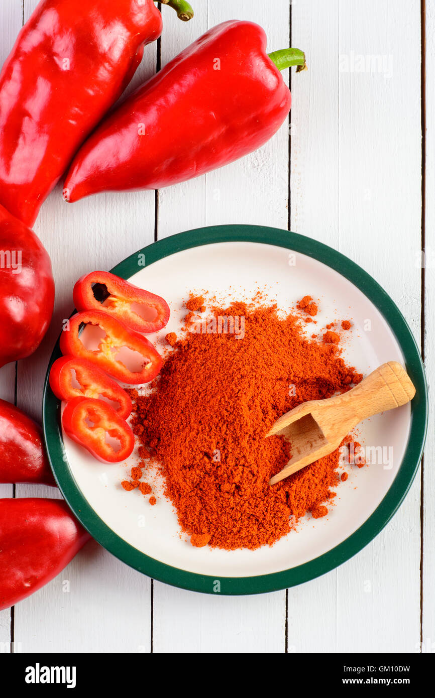Top view of fresh and dried colorful peppers on vintage wooden table ...