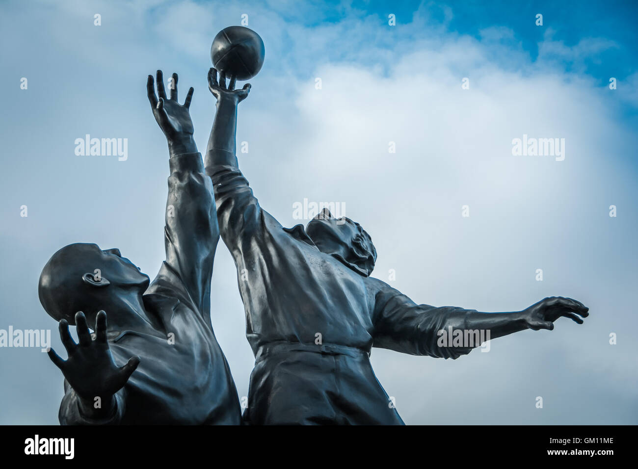 Iconic bronze of rugby line-out by sculptor Gerald Laing outside Twickenham Stadium, London, UK. Stock Photo