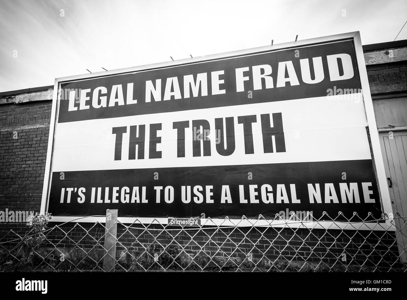 Legal name fraud, THE TRUTH, It's Illegal to use a legal Name Billboard near Carmarthen Carmarthenshire Black and white Stock Photo