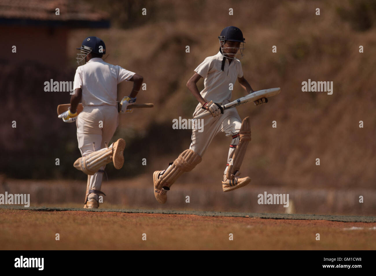 Balling Batting different stance batsman bowler batter umpire at a game of cricket in Goa Ponda Club level Stock Photo