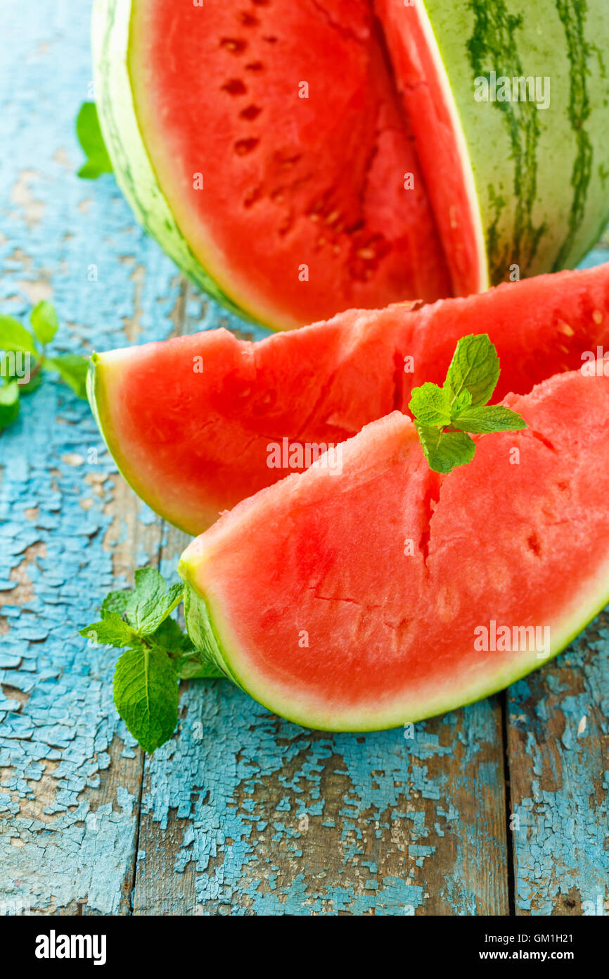 Fresh watermelon sliced with mint close up on the table Stock Photo