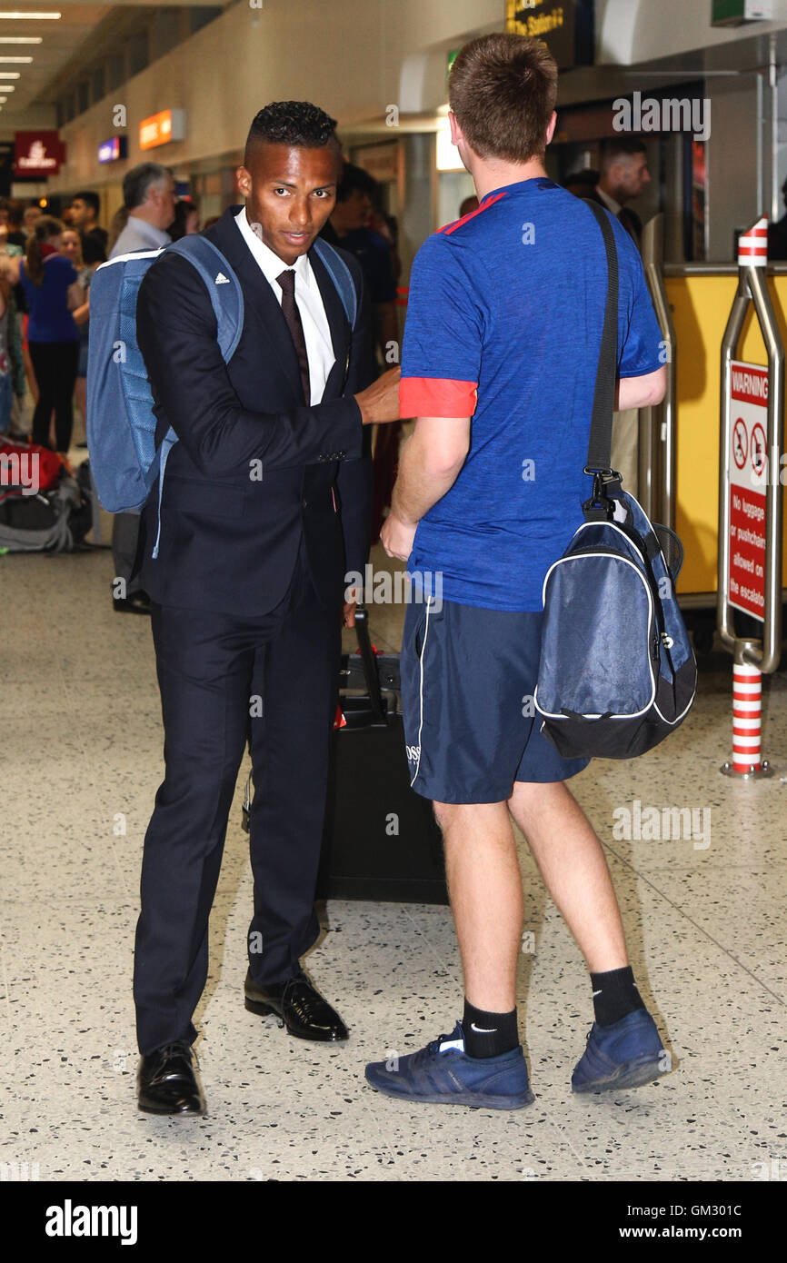 Antonio Valencia leaves Manchester airport for Manchester United's pre-season tour of China. Stock Photo