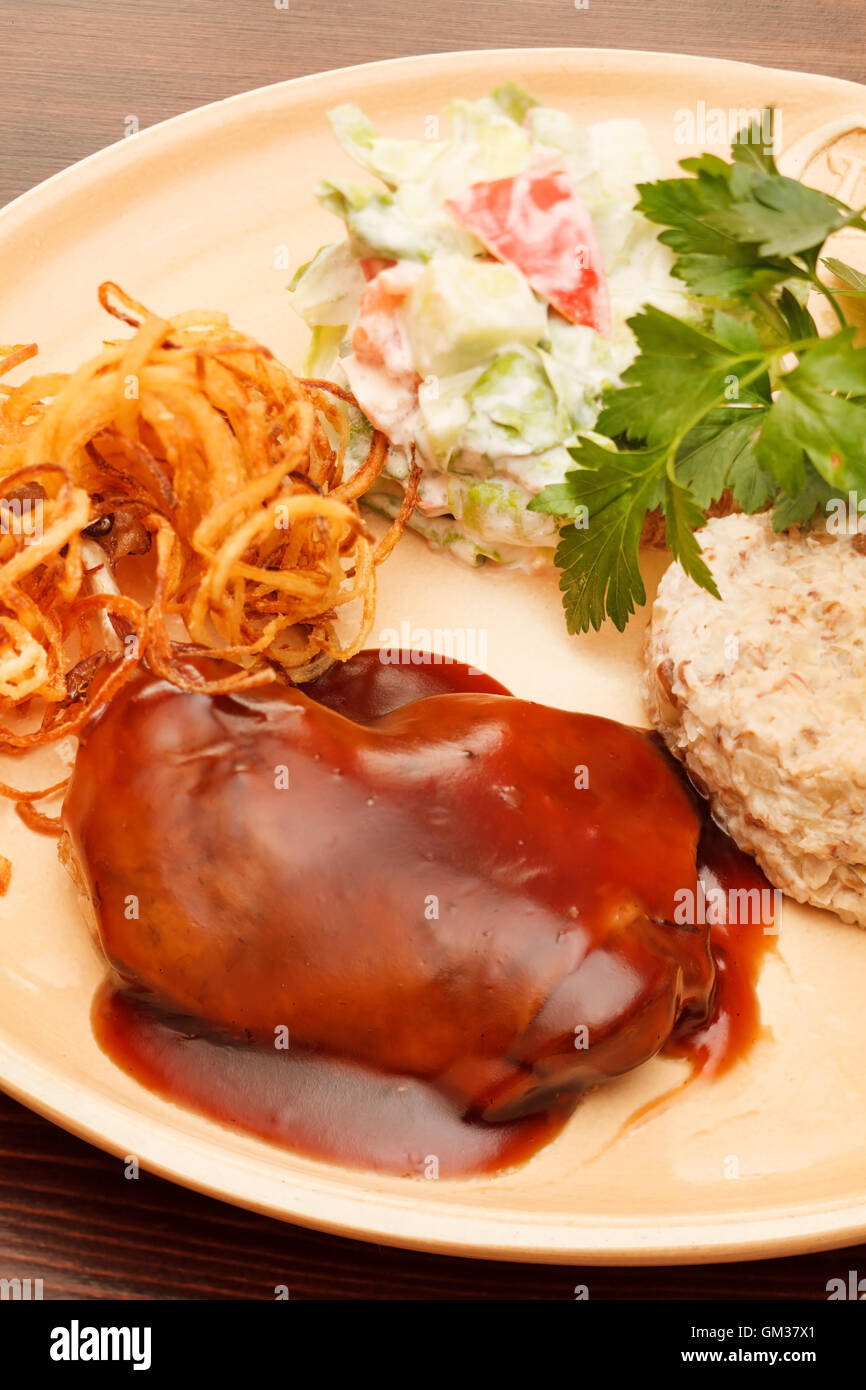 duck wings with sauce Stock Photo - Alamy