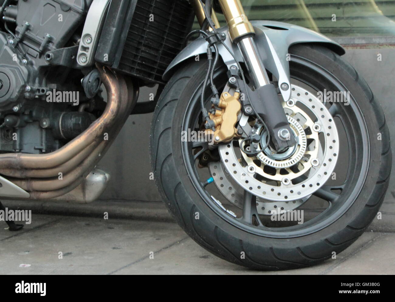 Front wheel of a motorbike Stock Photo Alamy