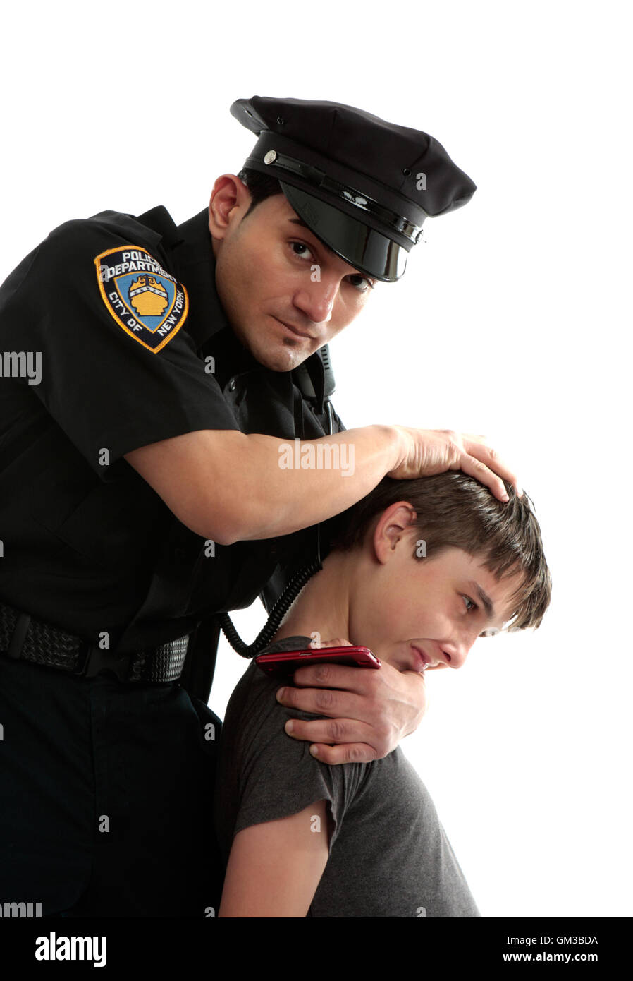 Police officer apprehending a teenage thief Stock Photo - Alamy
