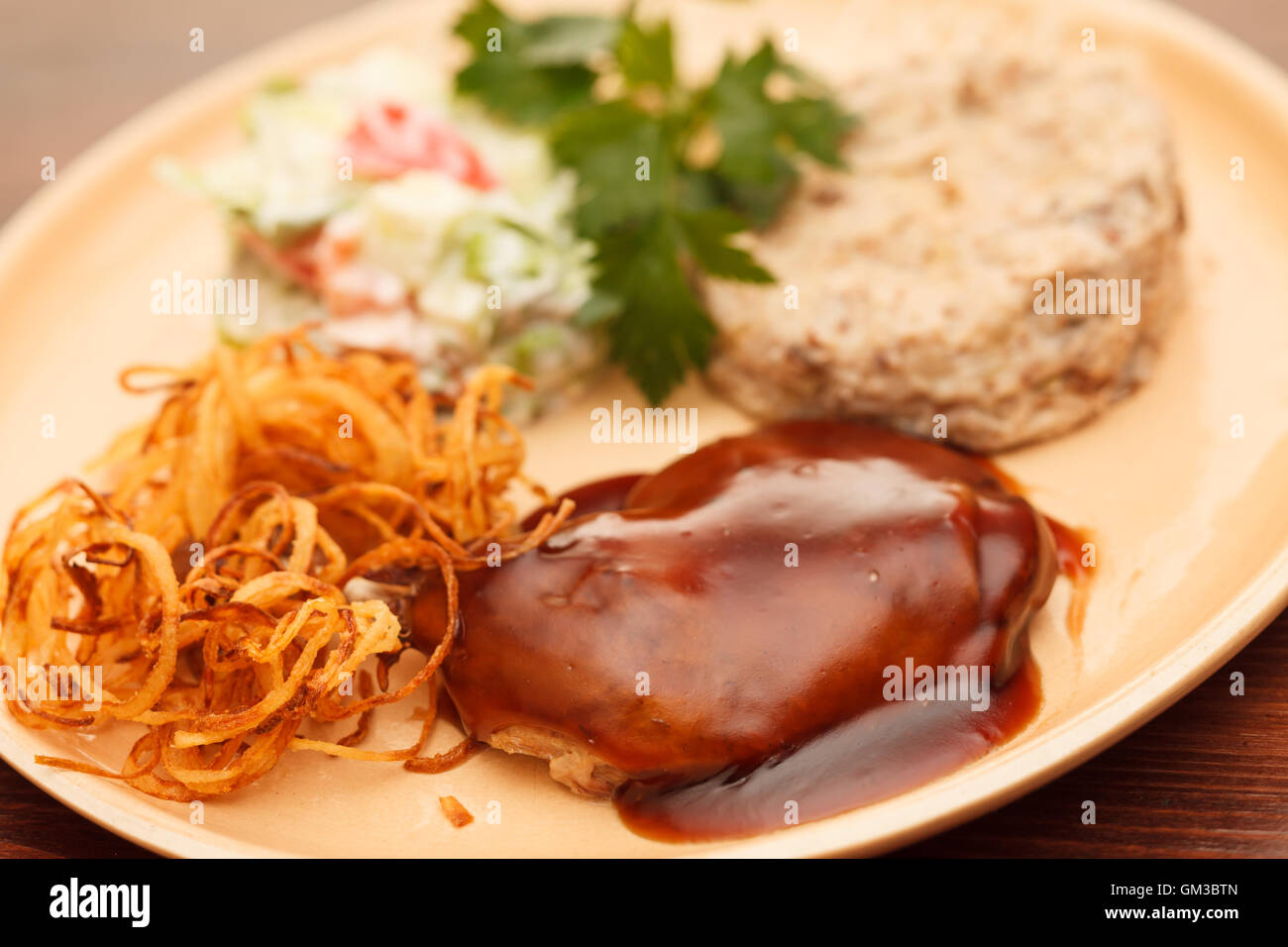duck wings with sauce Stock Photo - Alamy