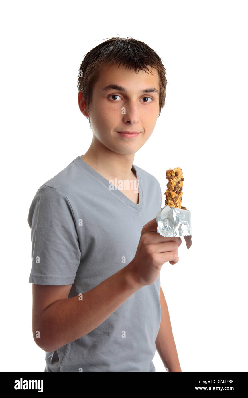 Boy holding a nutritional snack bar Stock Photo Alamy