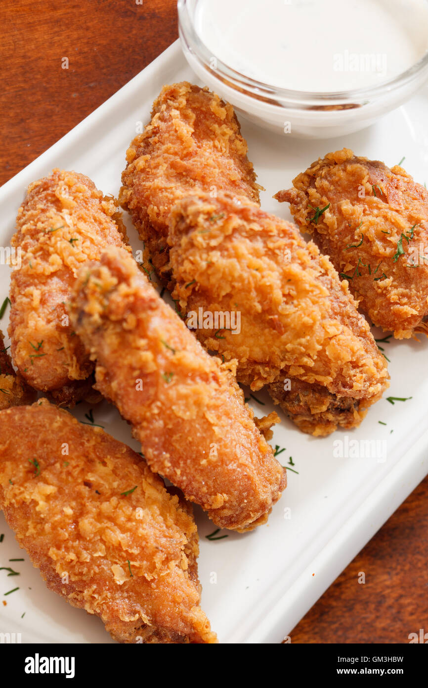 Chicken wings with sauce Stock Photo - Alamy