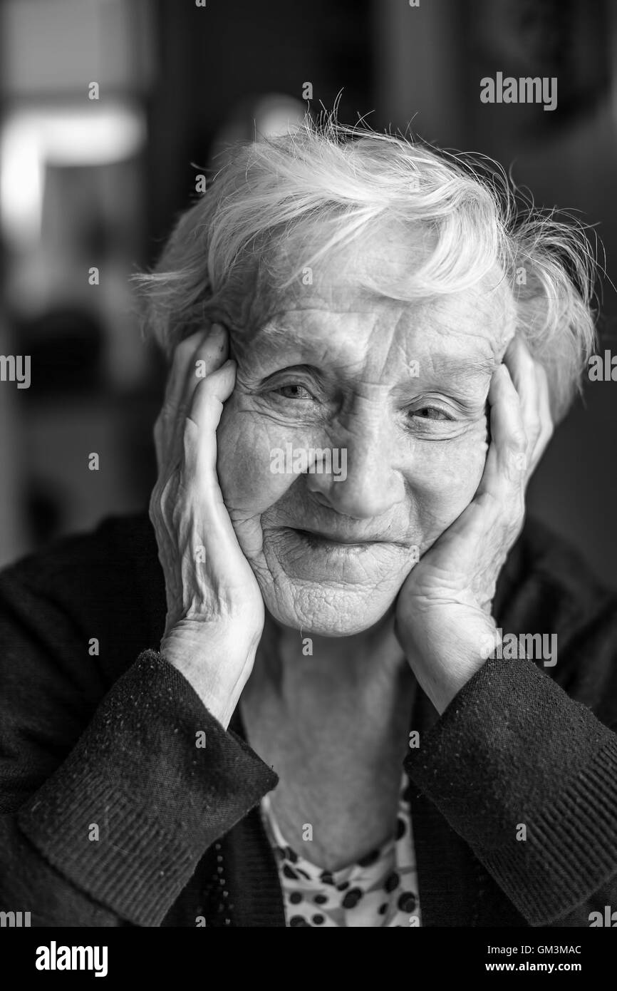 Black and white portrait of an old woman, close-up. Stock Photo