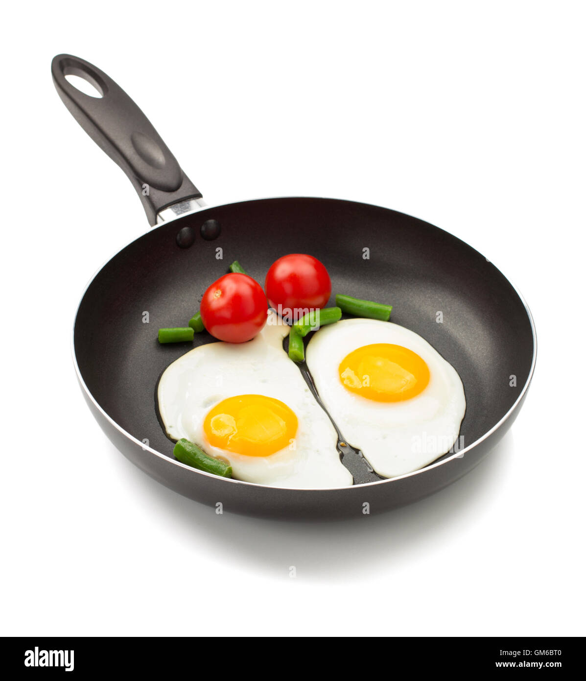 fried egg in frying pan isolated on white background Stock Photo - Alamy