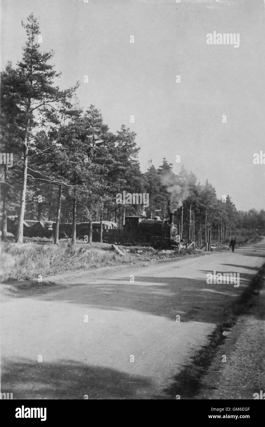 A train crosses Station Hill in Bordon, Hampshire on the Longmoor Military Railway before the Great War Stock Photo