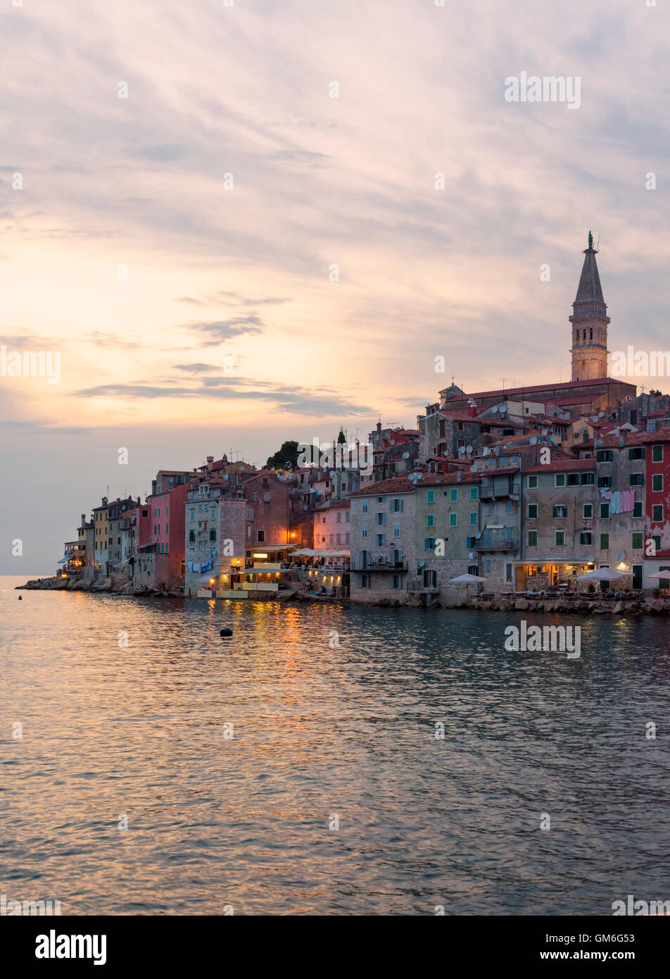 Sunset over the colourful weathered buildings of the old town peninsular of Rovinj, Istria, Croatia Stock Photo
