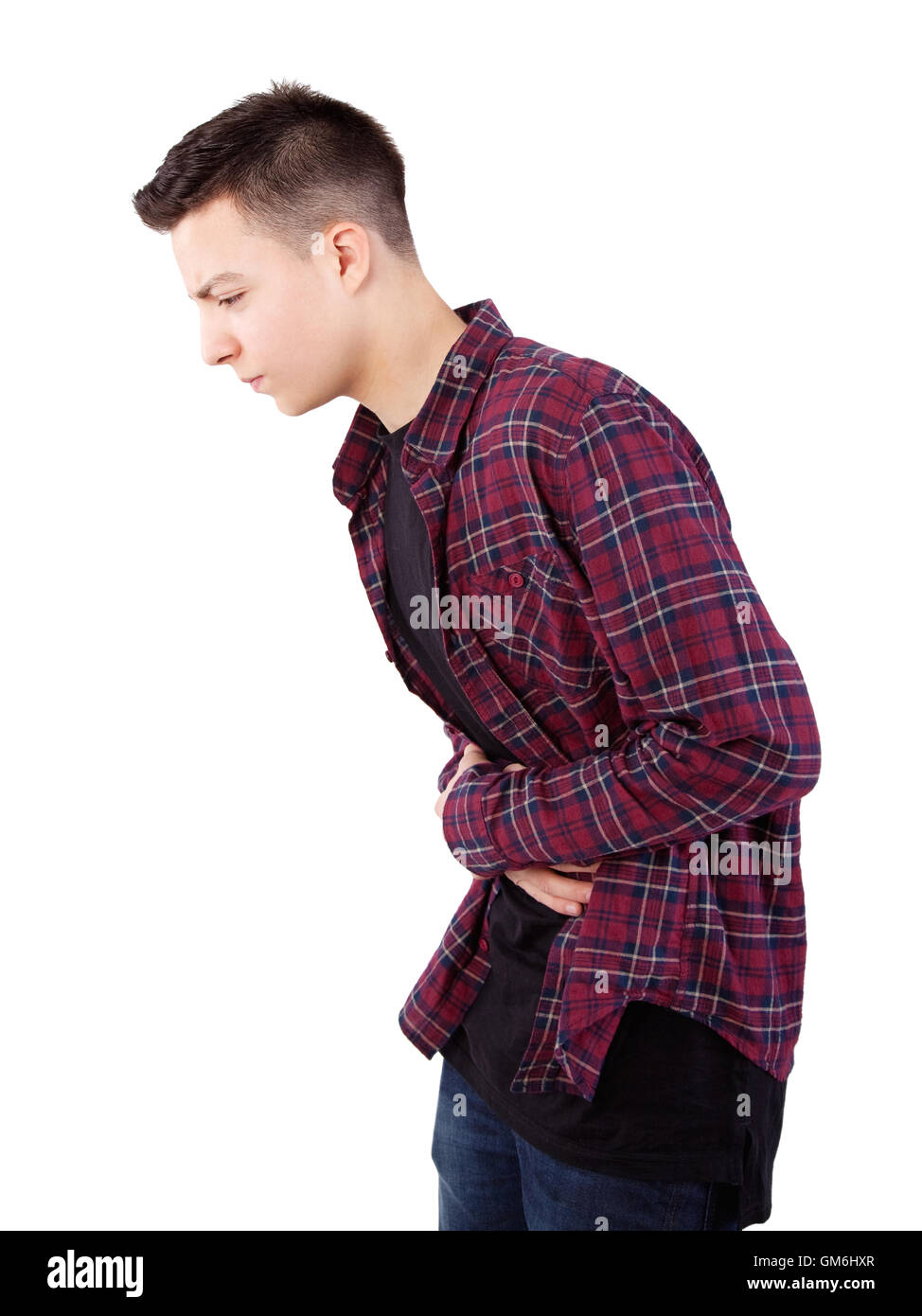 teenage boy with stomach pain Stock Photo