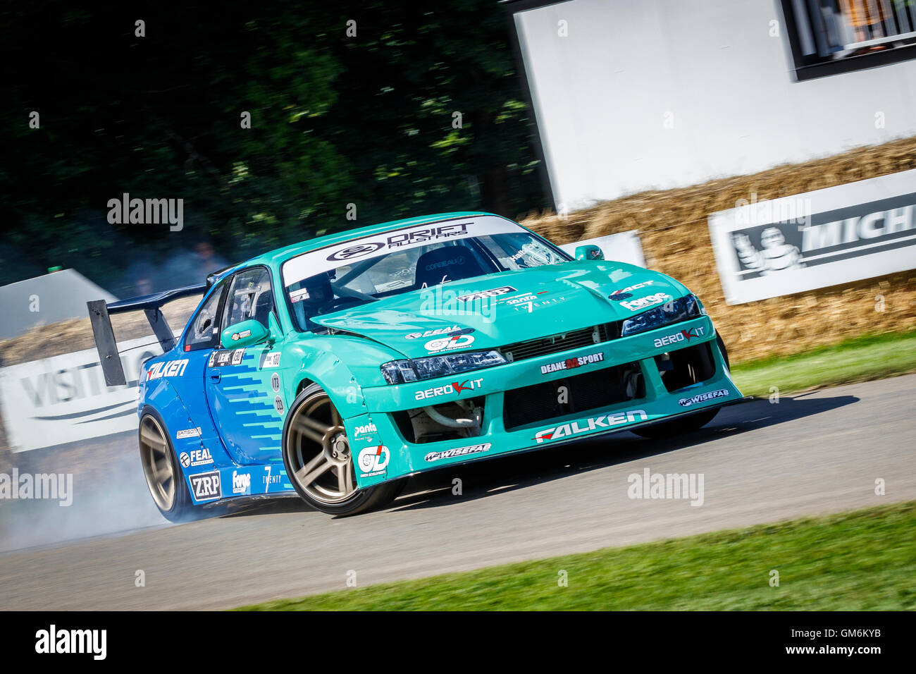 1993 Nissan 200SX S14 with driver James Deane drifts around the first corner at the 2016 Goodwood Festival Of Speed, Sussex, UK Stock Photo