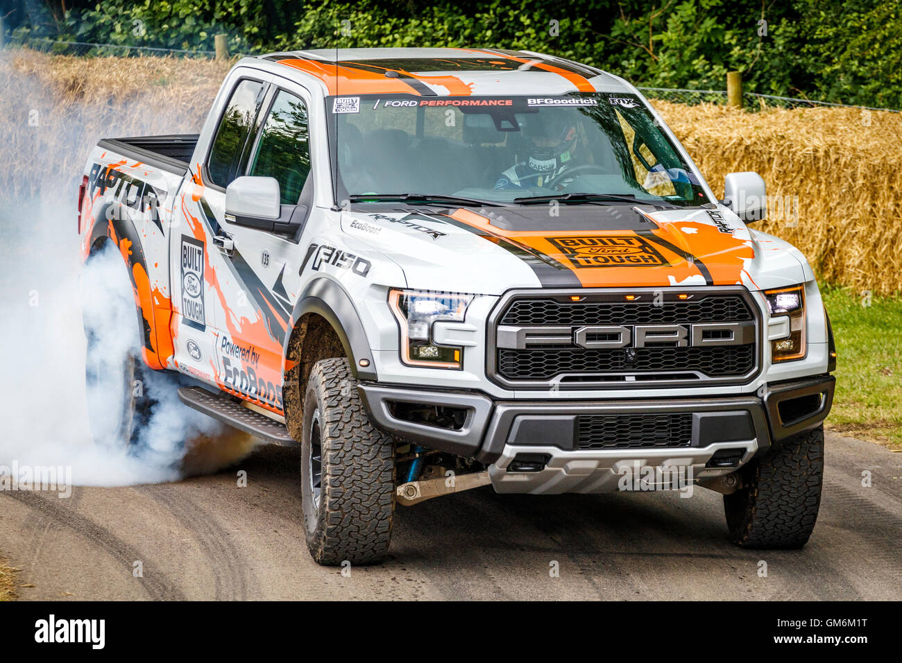 2016 Ford F-150 Raptor desert truck racer with driver Ben Collins at the 2016 Goodwood Festival of Speed, Sussex, UK. Stock Photo