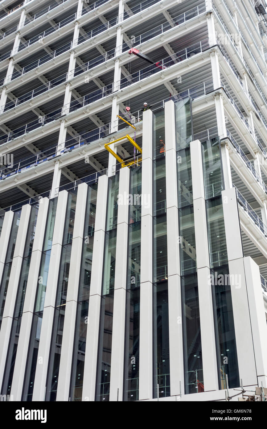 Exterior cladding going on to a new skyscraper, London Wall, UK Stock Photo