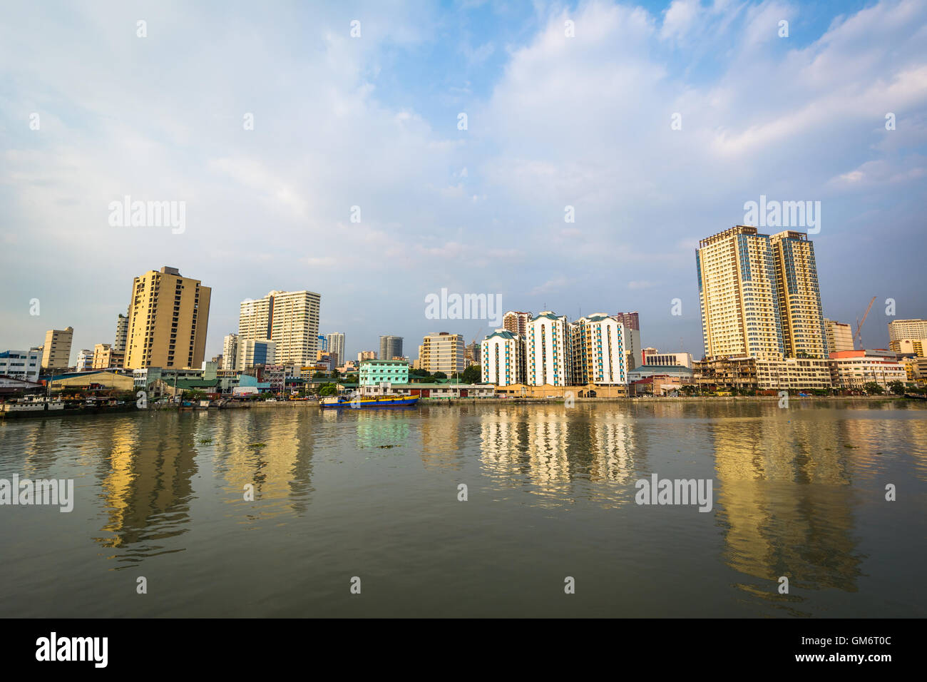 Buildings along the Pasig River, seen from Fort Santiago, in Intramuros, Manila, The Philippines. Stock Photo