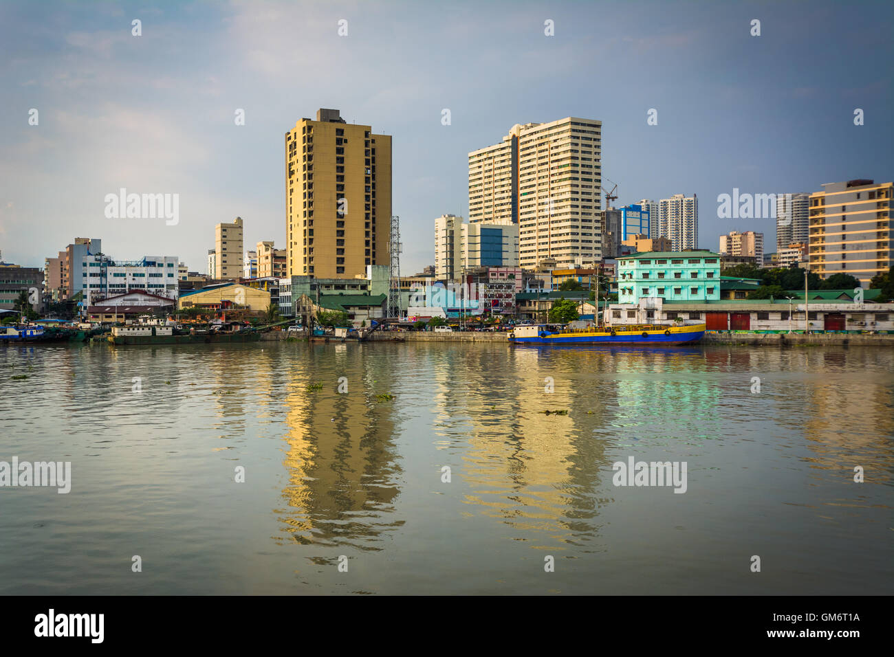 Buildings along the Pasig River, seen from Fort Santiago, in Intramuros, Manila, The Philippines. Stock Photo