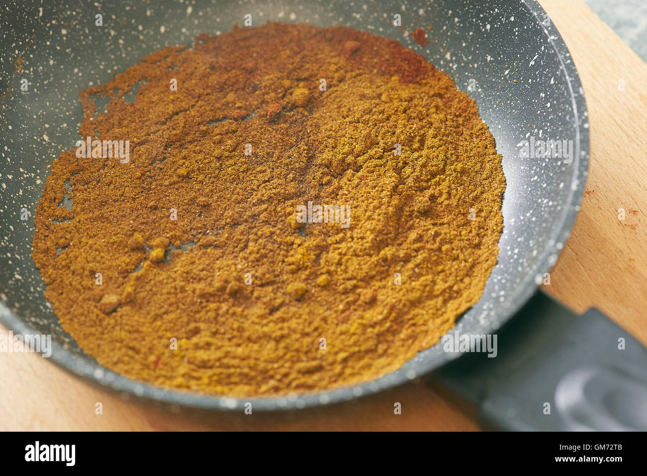 toasting spicy powder for cooking delicious international recipes Stock Photo