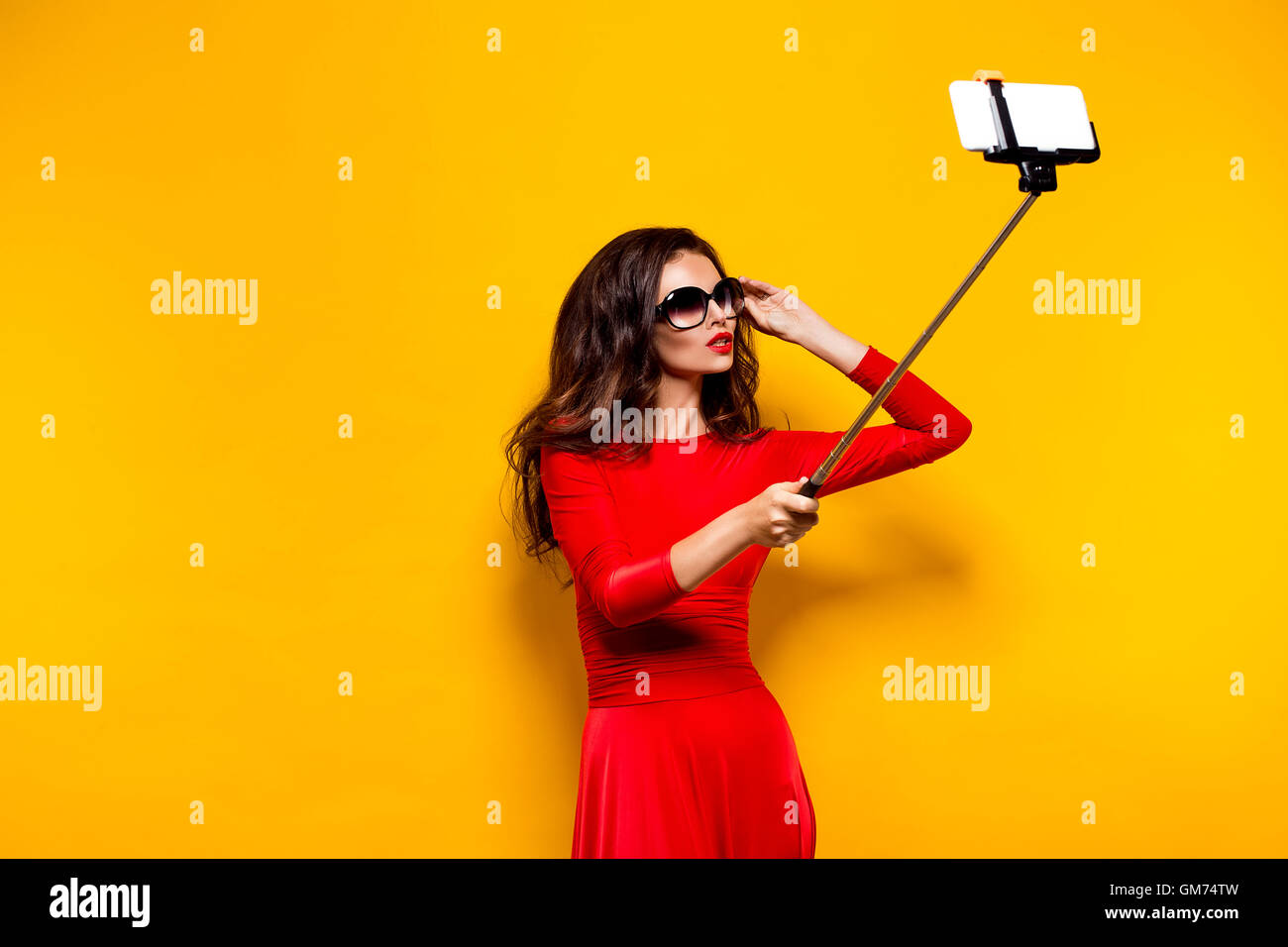Gadget brunette hi-res stock photography and images - Alamy