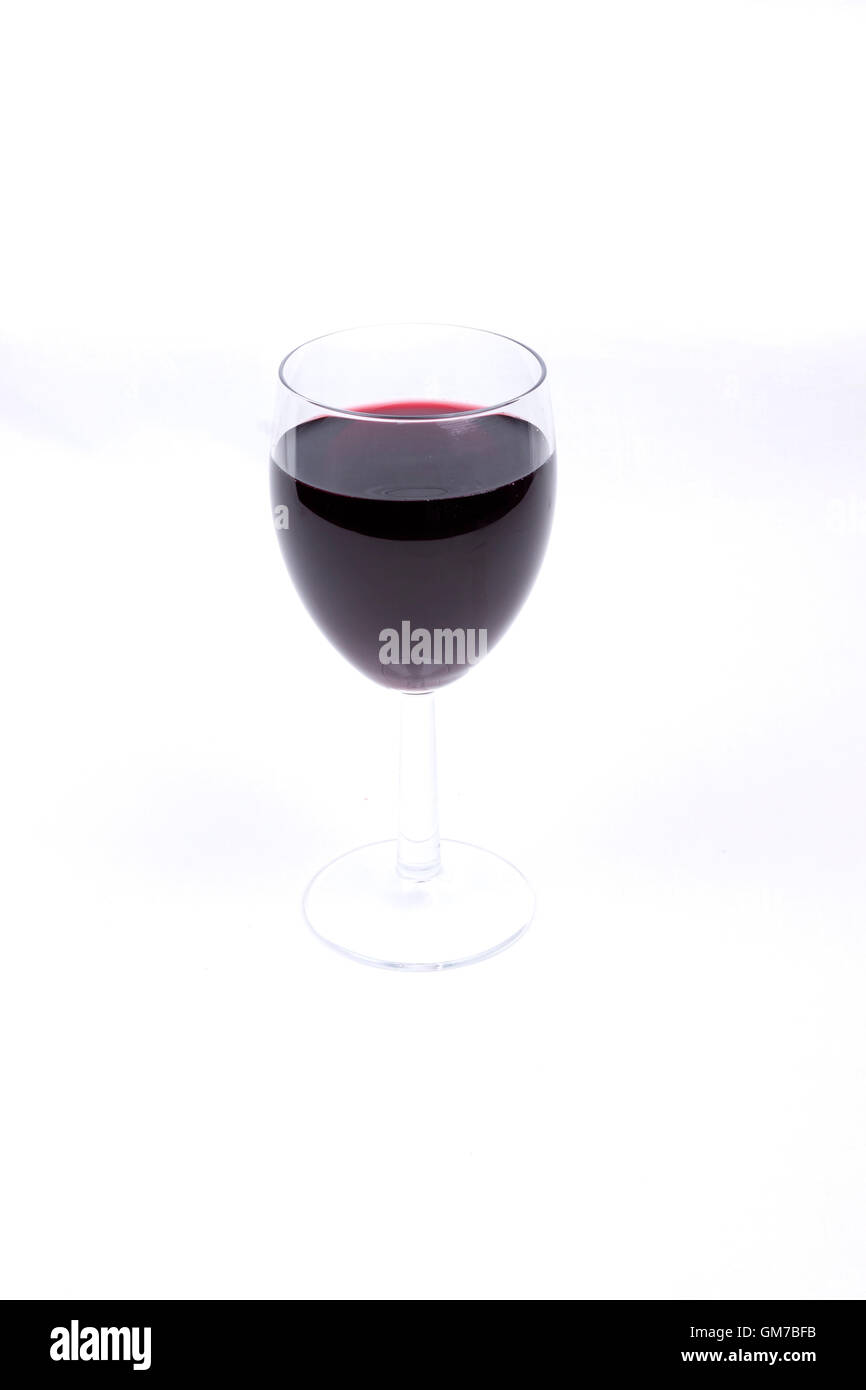 A glass of red wine on white background Stock Photo - Alamy