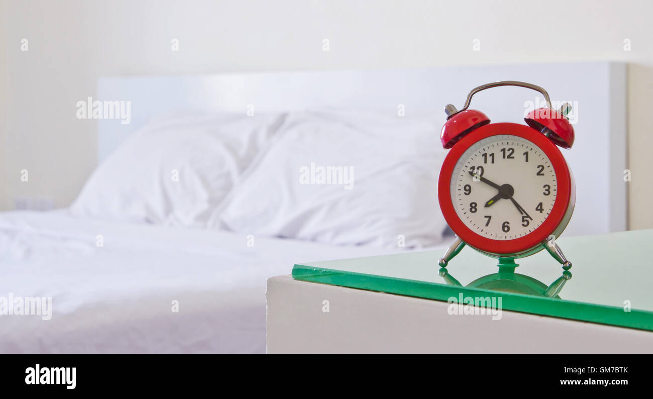 Alarm clock in the bedroom Stock Photo Alamy