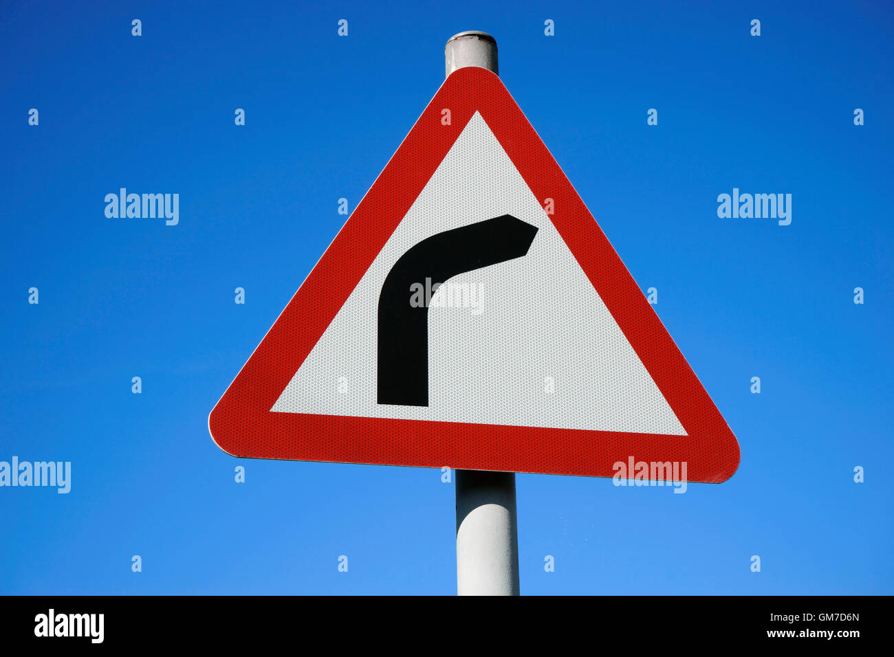 UK, Road Traffic Sign, Dangerous Curve Ahead Stock Photo