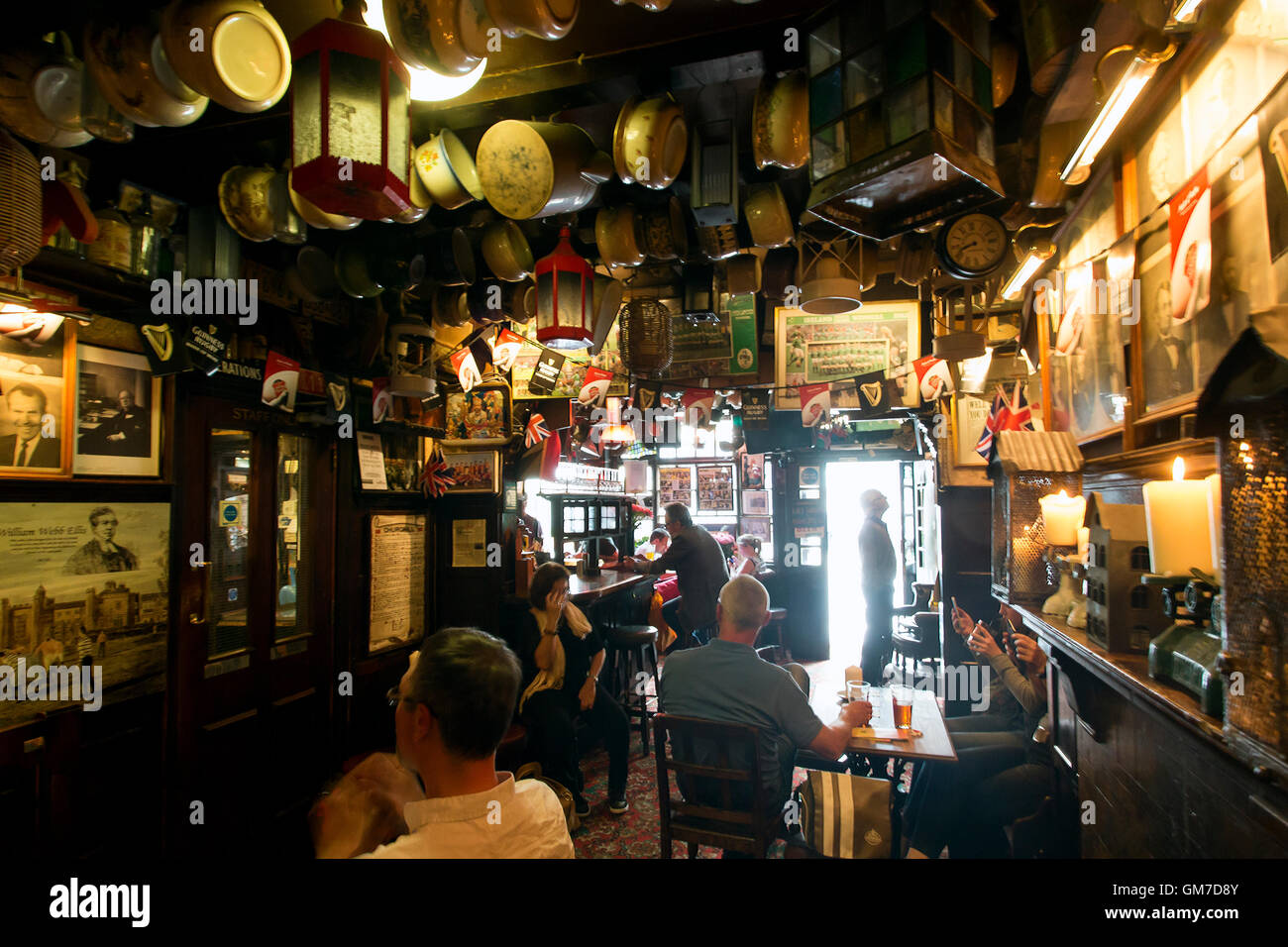 London, UK - May 7, 2016: Inside view of a public house, known as pub, for drinking and socializing, is the focal point of the c Stock Photo