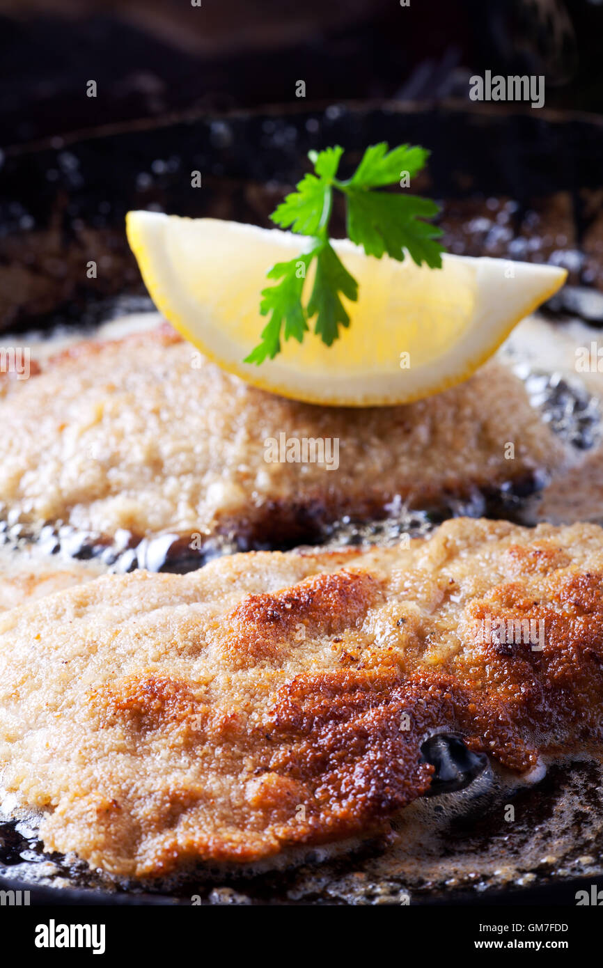 wiener schnitzel frying in a pan Stock Photo Alamy