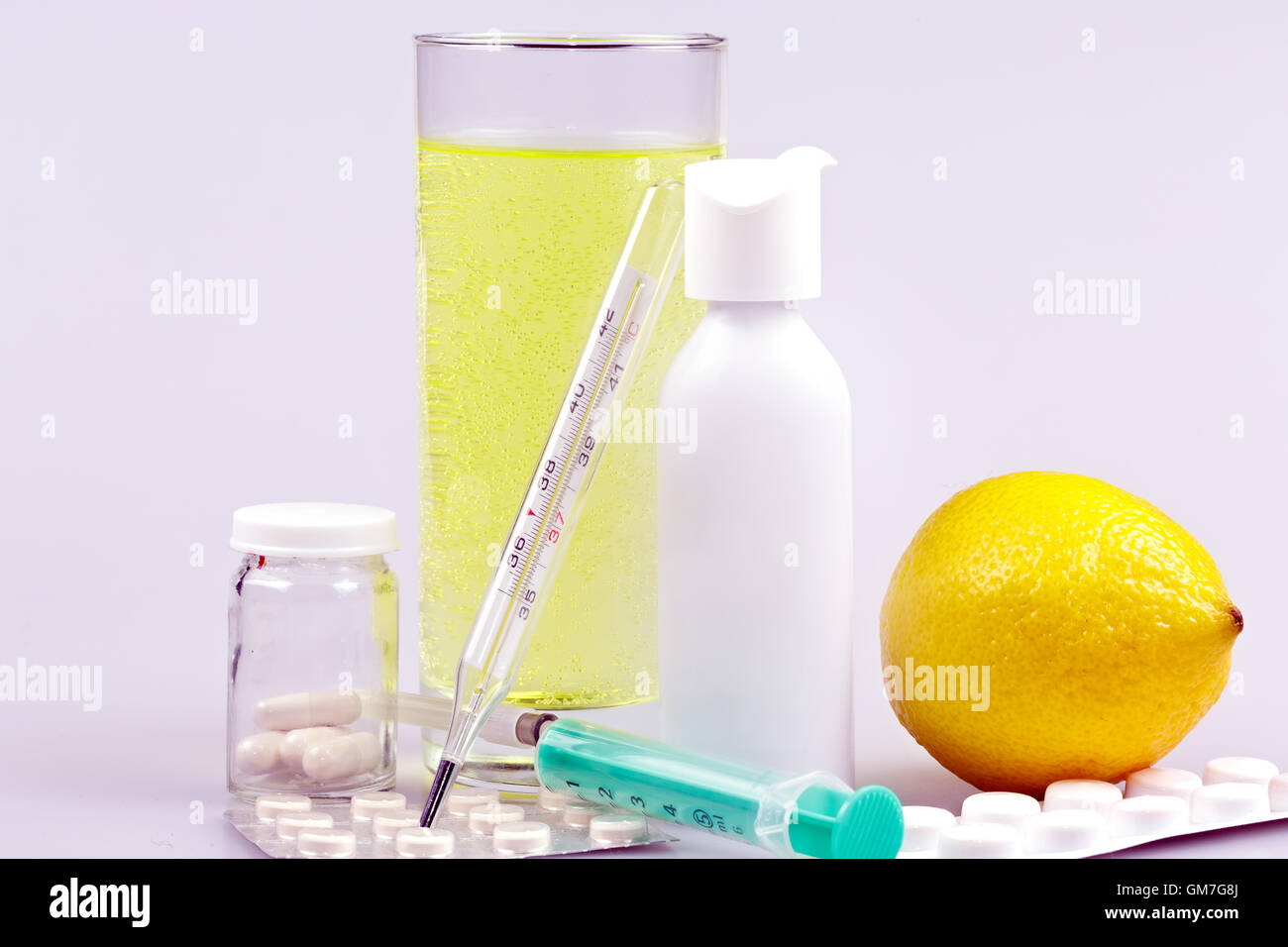 Medical supplies, tablets and capsules, spray throat and drink Stock Photo