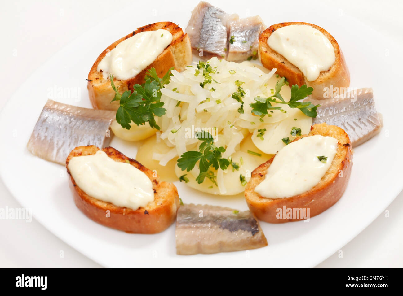 herring with potatoes Stock Photo Alamy