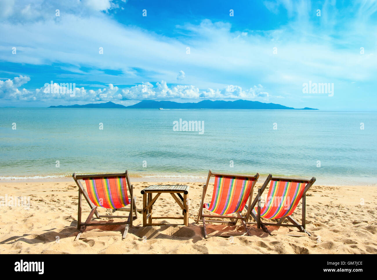 Chairs on beach near the sea Stock Photo - Alamy