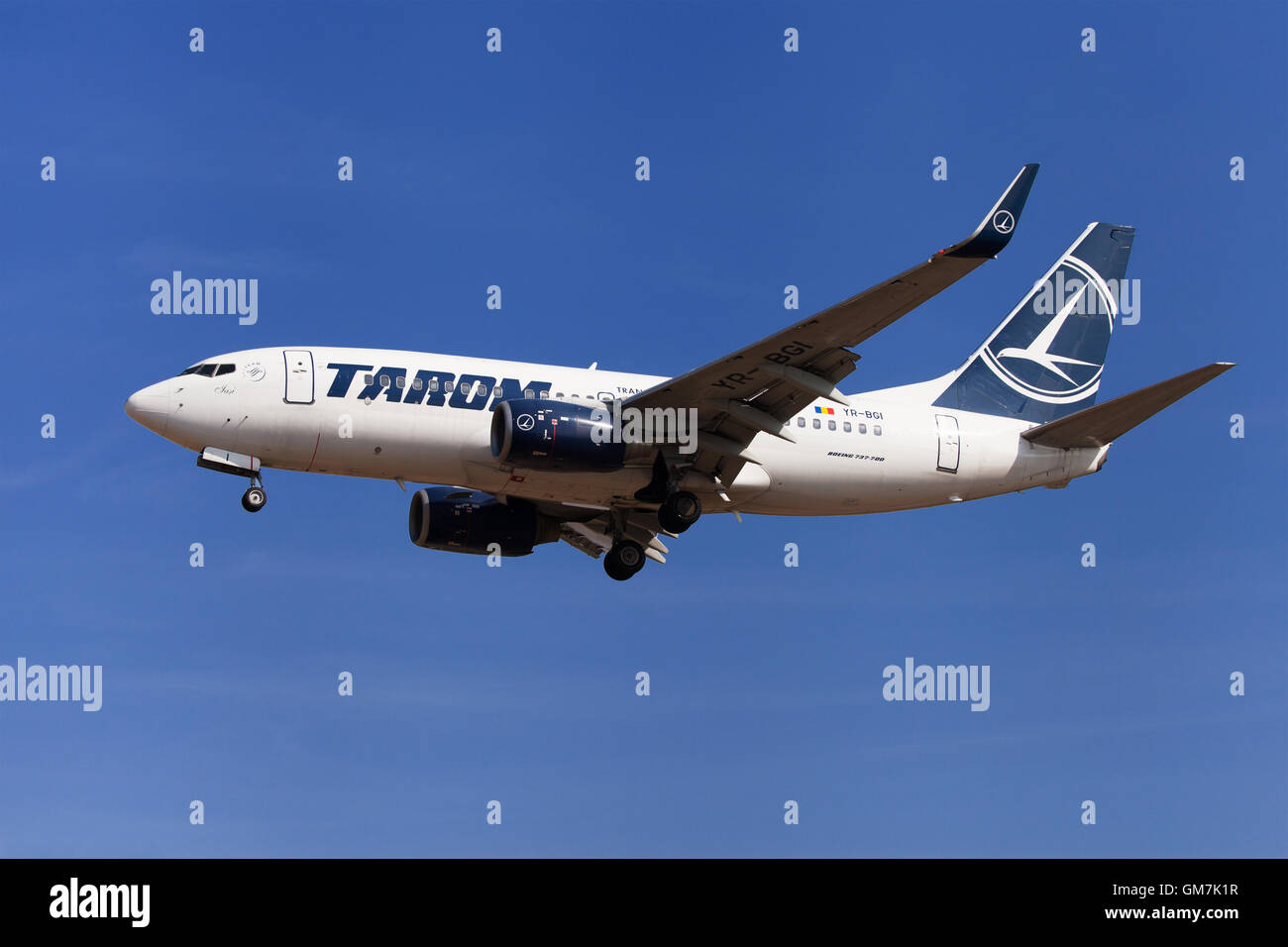 Tarom Boeing 737-700 approaching to El Prat Airport in Barcelona, Spain. Stock Photo