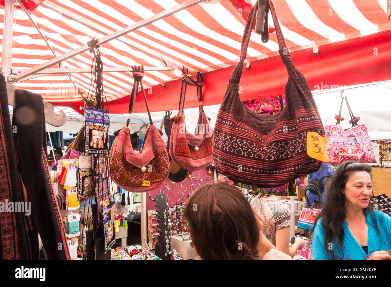 Market stall clothes bags hi-res stock photography and images - Alamy