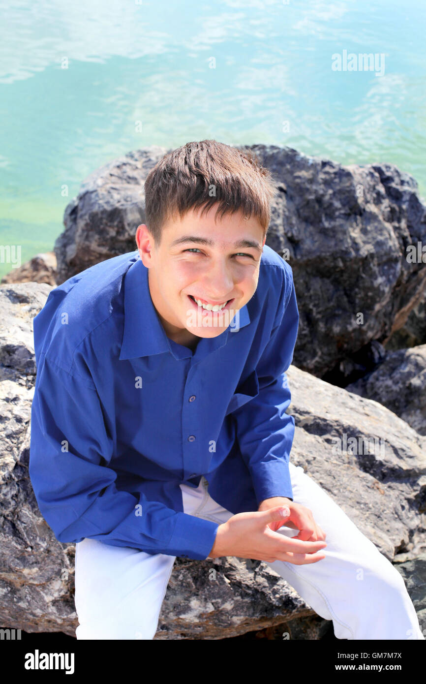 Handsome teenager smile beach hi-res stock photography and images - Alamy