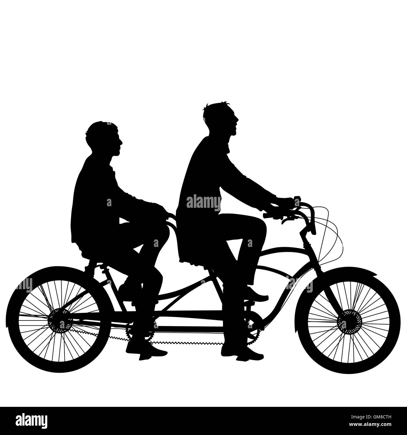 Silhouette of two athletes on tandem bicycle. Stock Photo