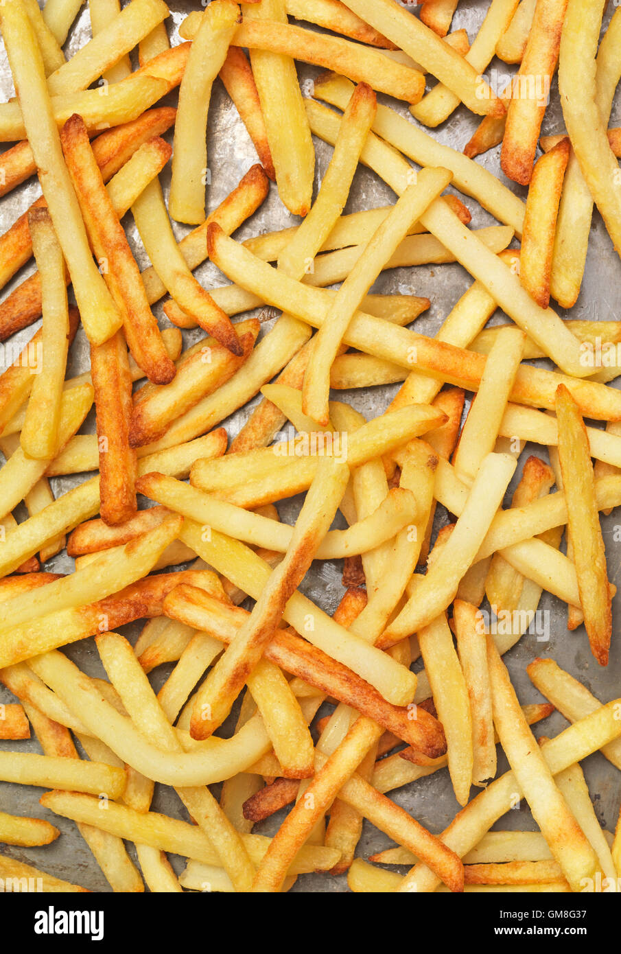 French fries on a baking tray Stock Photo