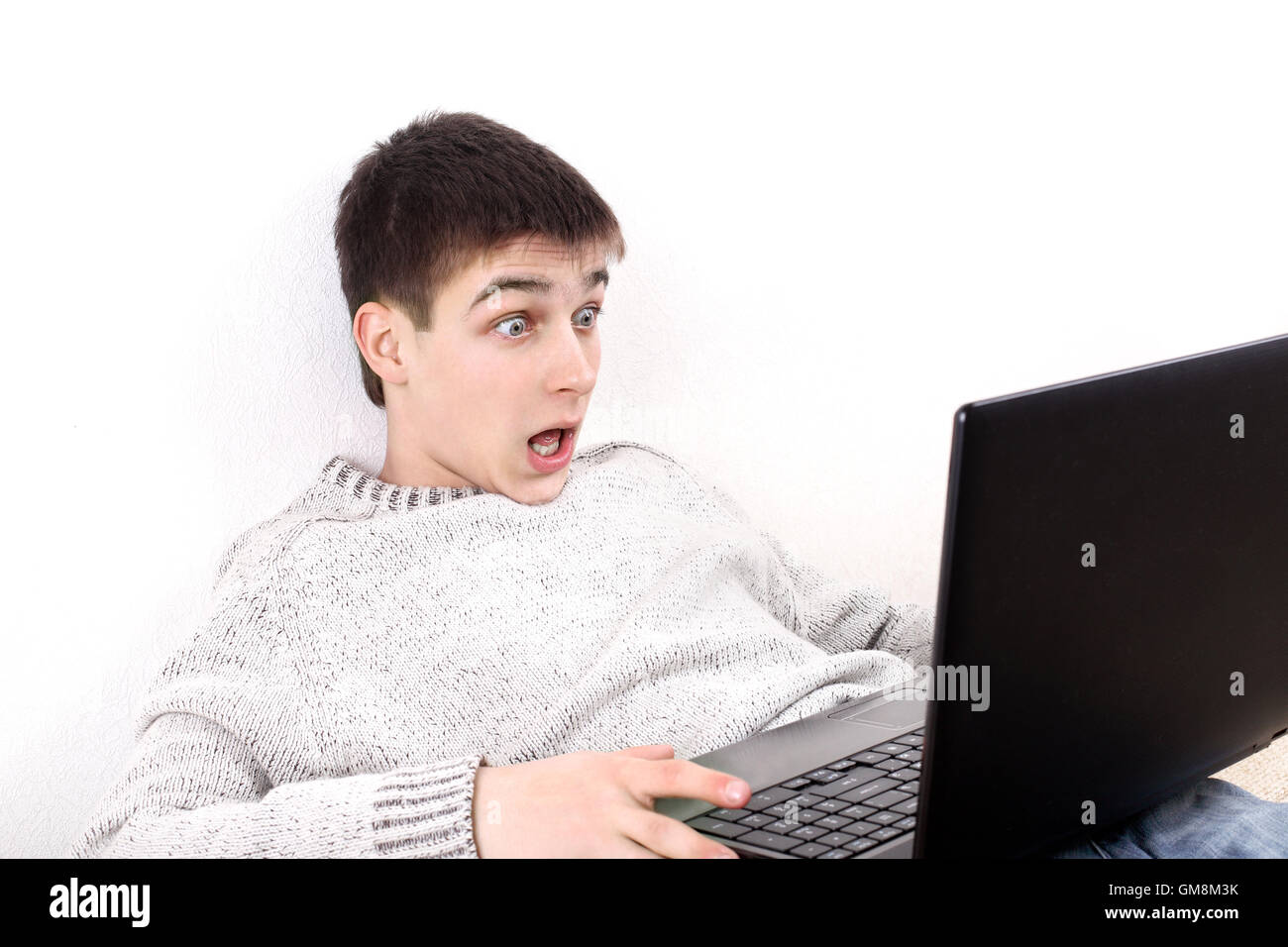 surprised teenager with notebook Stock Photo - Alamy