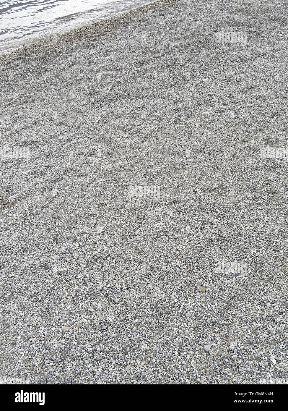 Full frame shot of gray gravel beach shore Stock Photo