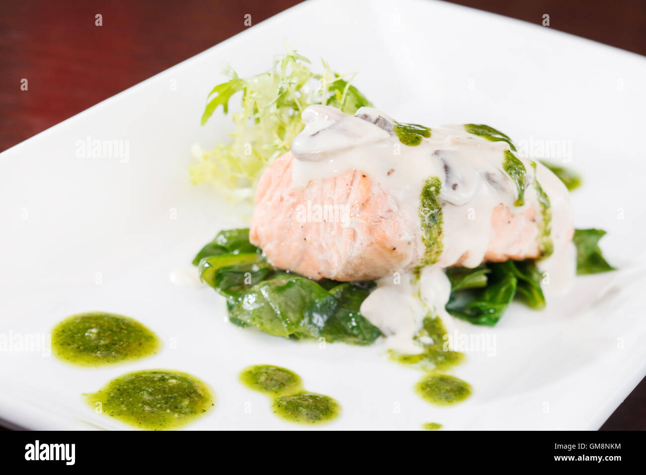 Salmon Fillet in Cream Sauce Stock Photo - Alamy
