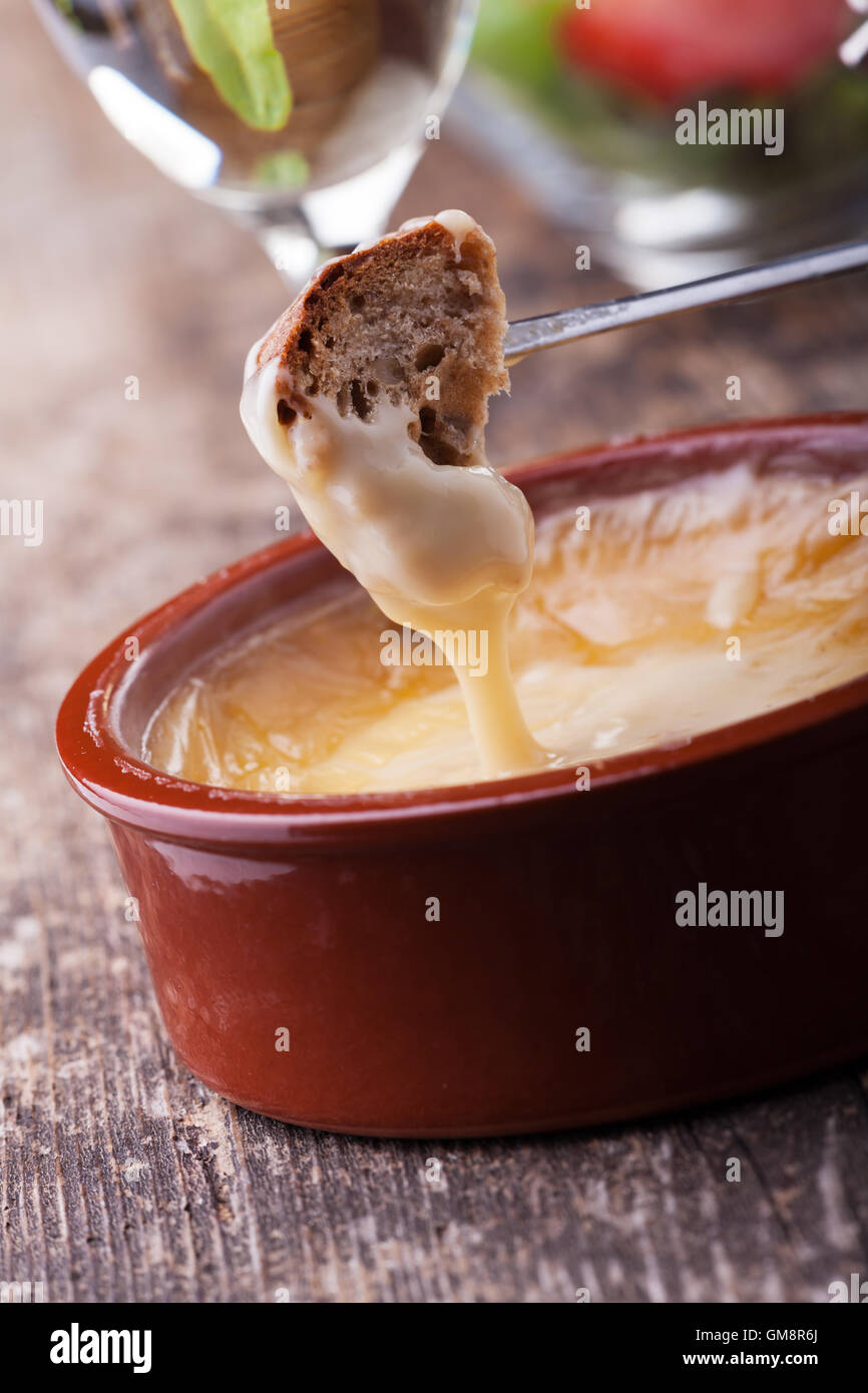 bread and cheese fondue Stock Photo Alamy