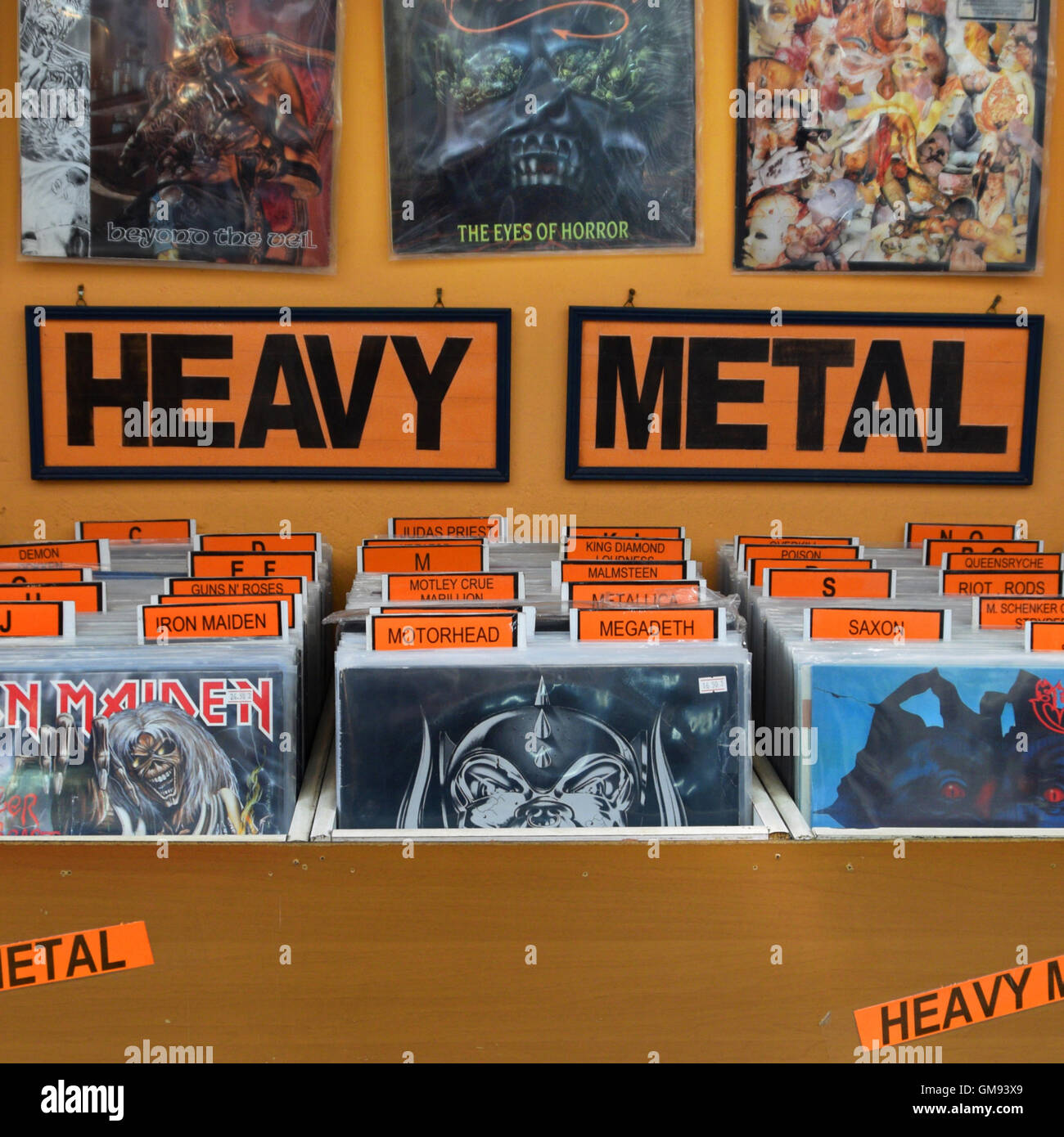 Heavy metal hard rock music vinyl records from the 1980s organized alphabetically and by popular bands. Stock Photo
