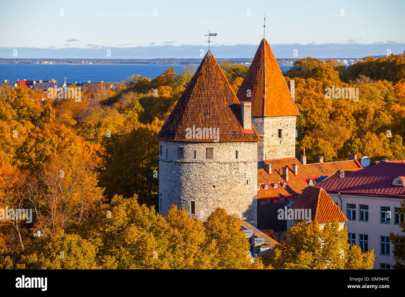 Medieval towers of old Tallinn at gold autumn season Stock Photo