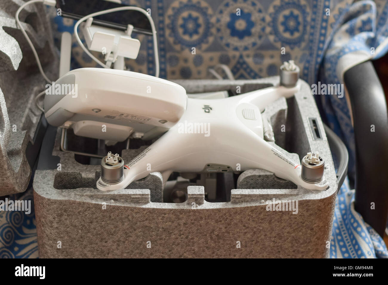 Russia, Poltavskaya village - May 1, 2016: Quadrocopters DJI Phantom 4 in its own carrying case open. Unpacking new quadrocopter Stock Photo