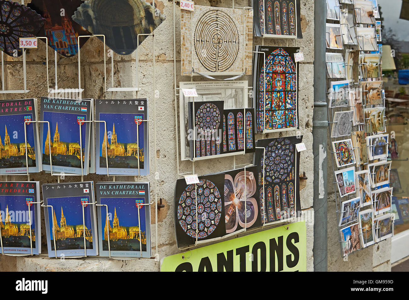 Postcards and guide books on sale outside a shop in central Chartres Stock Photo