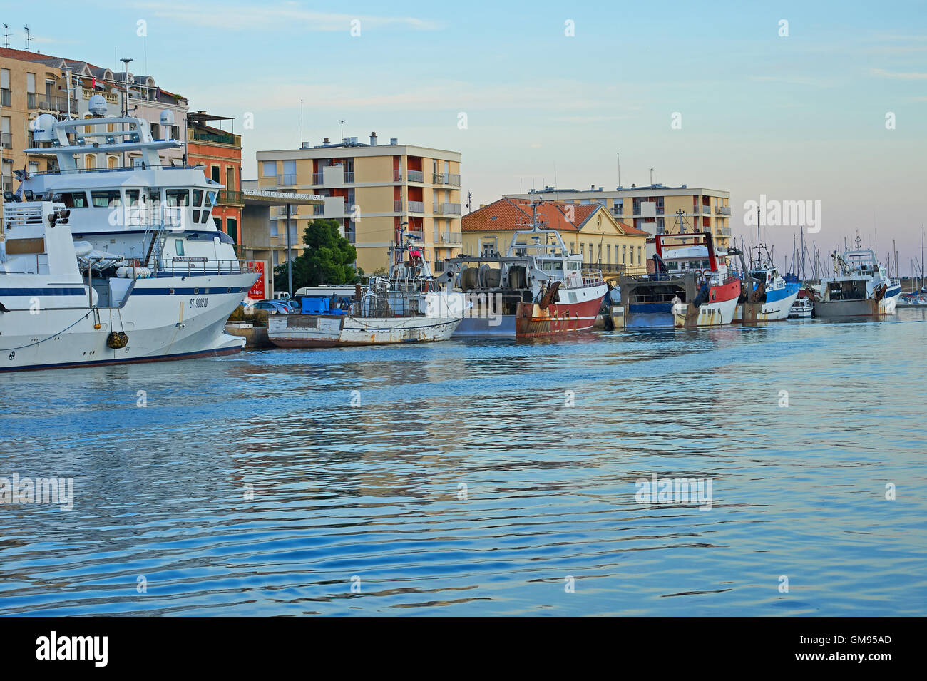 Boats in the harbour canal system in the southern French town of Sete Stock Photo