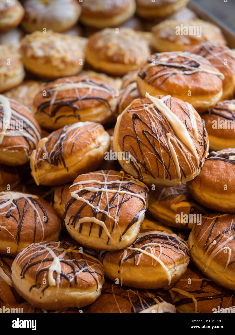 Freshly made sweet doughnuts on sale at the Borough market in London Stock Photo